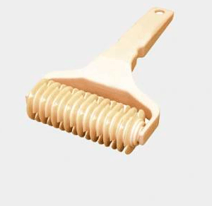 RODILLO CORTA FROLA PLASTICO DEBYER